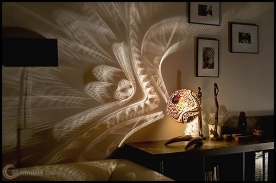 Elaborated patterns on gourds: extraordinary lamps by Calabarte