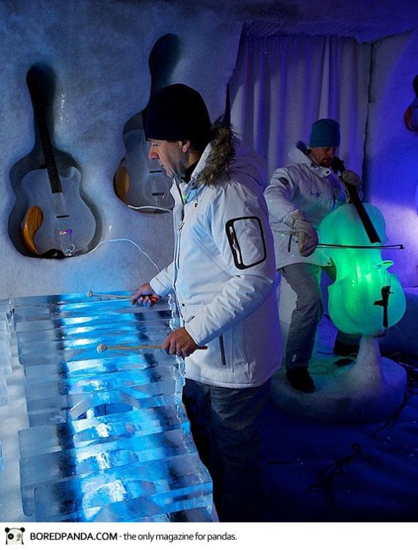 Orchestra performs in igloo with instruments made of ice