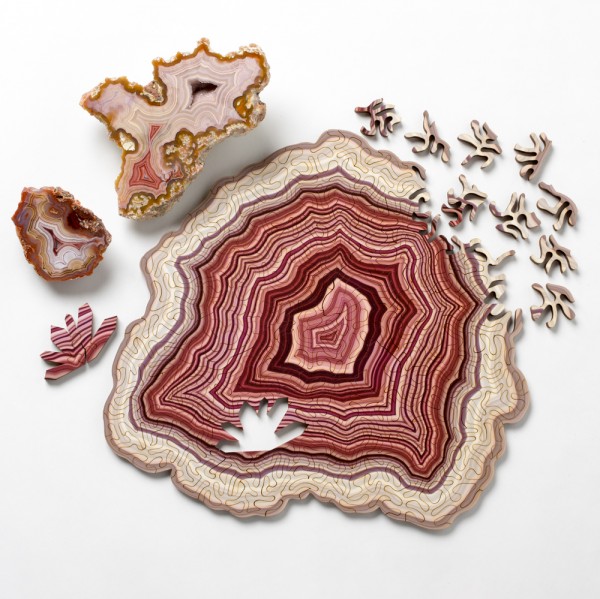 Computer-generated jigsaw puzzles based on geological forms