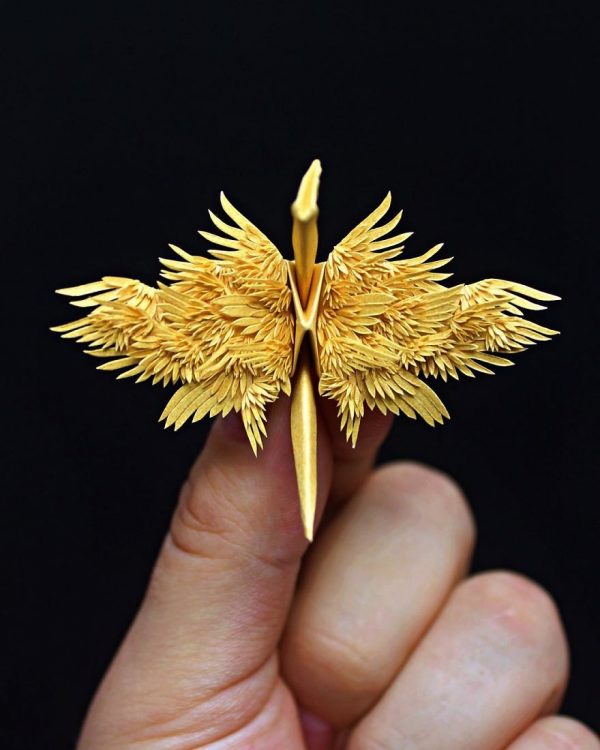 Folded and decorated origami crane project by Cristian Marianciuc