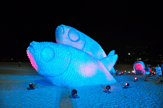 Giant fish sculptures made from discarded plastic bottles in Rio