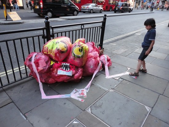 Street artist turns unwanted trash into whimsical, quirky characters