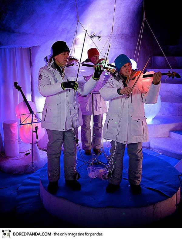 Orchestra performs in igloo with instruments made of ice