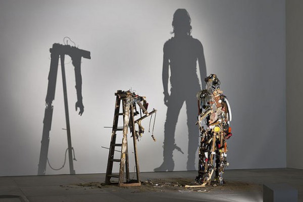 Shadow art created using garbage by Tim Noble and Sue Webster