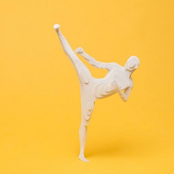 Olympic athletes crafted from layers of paper by Raya Sader Bujana