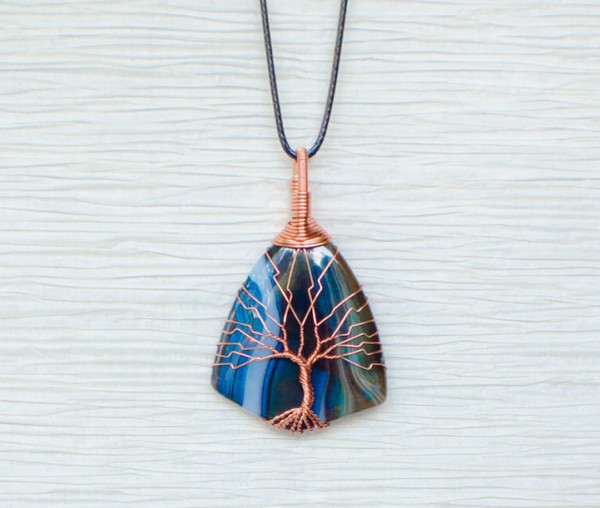 Tree of Life necklaces created by Recycled Beautifully