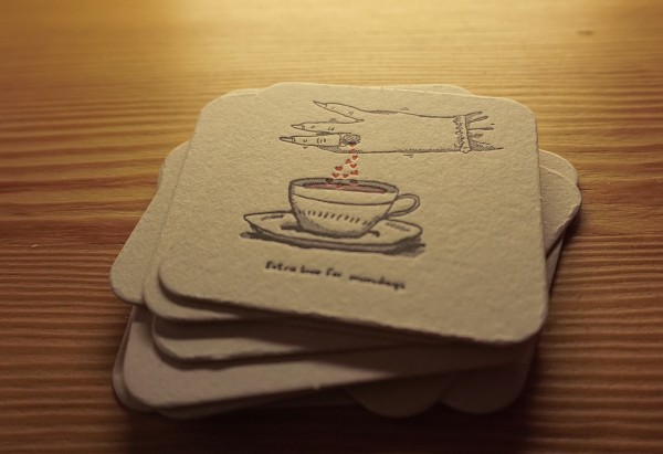Coffee coasters, illustration by Antanas Dubra