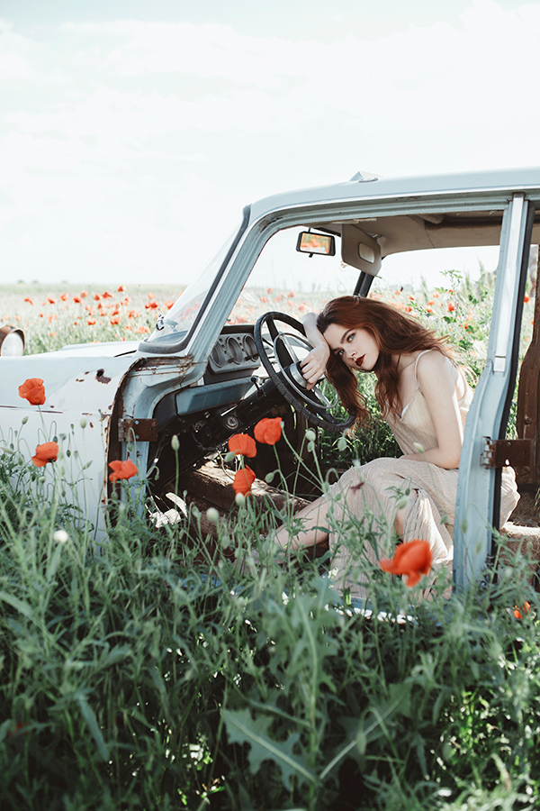Abandoned car and poppy field, photography by Jovana Rikalo