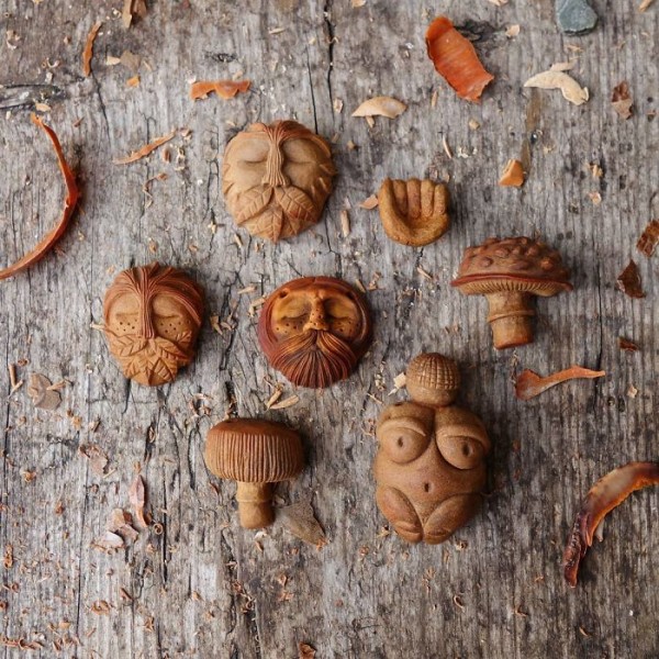 Avocado pits carved into magical forest creatures by Jan Campbell