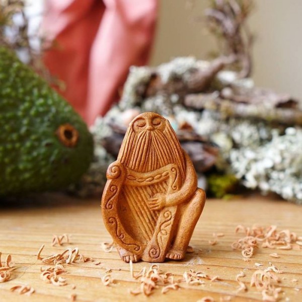 Avocado pits carved into magical forest creatures by Jan Campbell