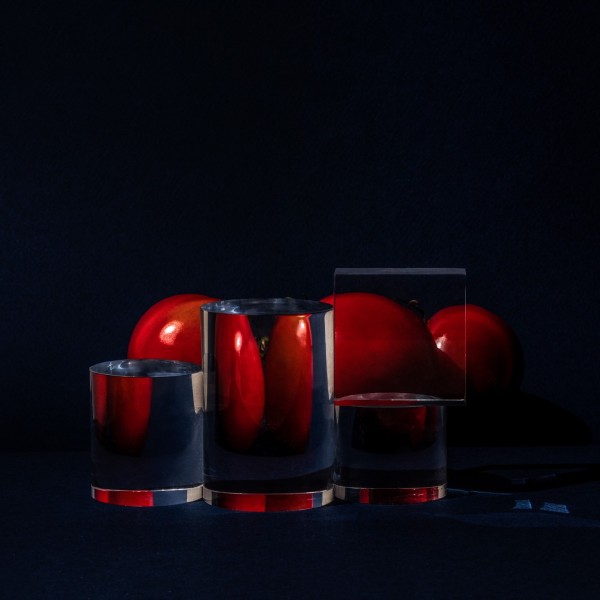 Foods distorted through liquid and glass, photography by Suzanne Saroff