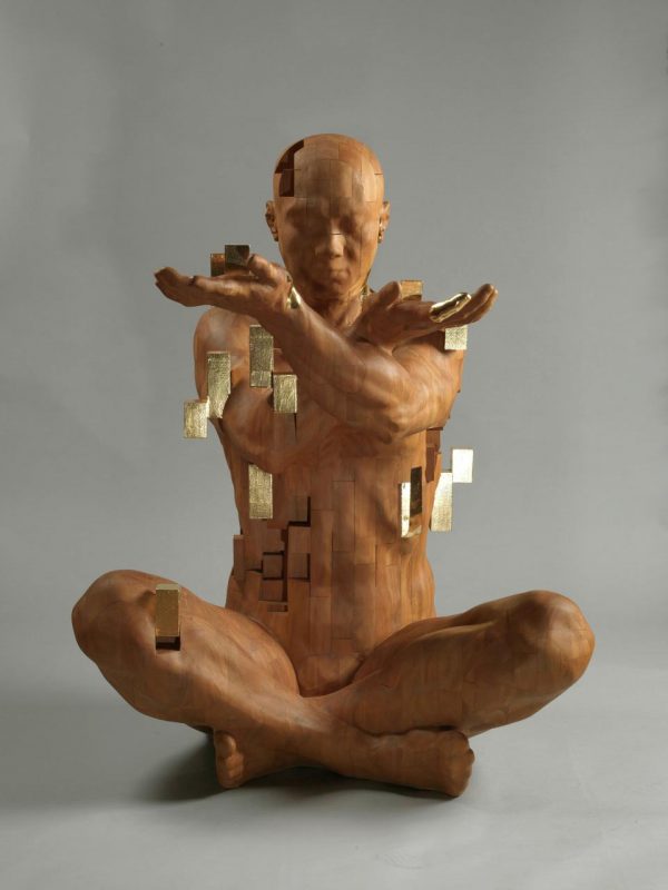 Pixelated cubes, figurative wooden sculptures by Han Hsu-Tung