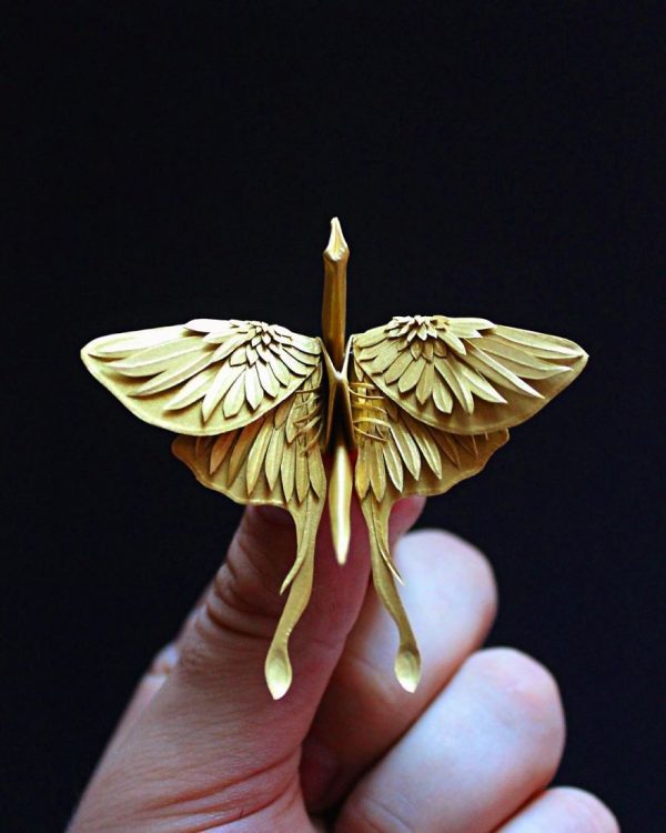 Folded and decorated origami crane project by Cristian Marianciuc